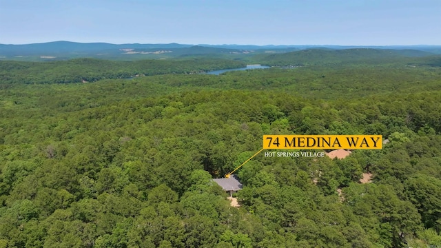 74 Medina Way, Hot Springs Village, AR 71909 - bird's eye view of a heavily wooded area and a water and mountain view