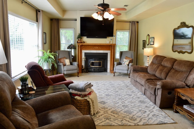 1005 Georgia Ridge Rd, Searcy, AR 72143 - living area with a ceiling fan, healthy amount of natural light, light carpet, and a fireplace with flush hearth