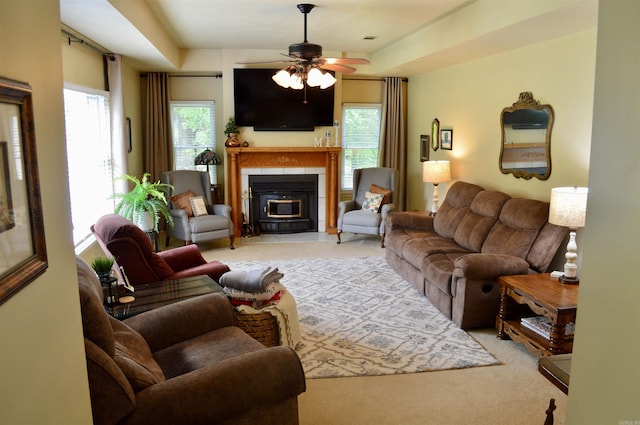 1005 Georgia Ridge Rd, Searcy, AR 72143 - living area with carpet floors, a ceiling fan, and a fireplace with flush hearth