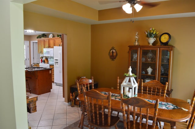 1005 Georgia Ridge Rd, Searcy, AR 72143 - dining space with a ceiling fan and light tile patterned floors