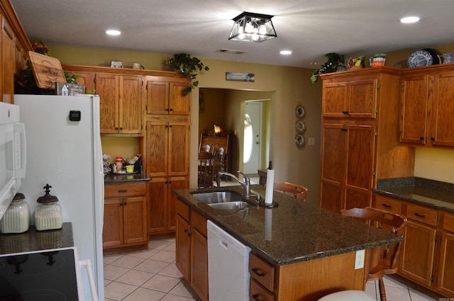 1005 Georgia Ridge Rd, Searcy, AR 72143 - kitchen featuring white appliances, a sink, light tile patterned flooring, brown cabinetry, and recessed lighting