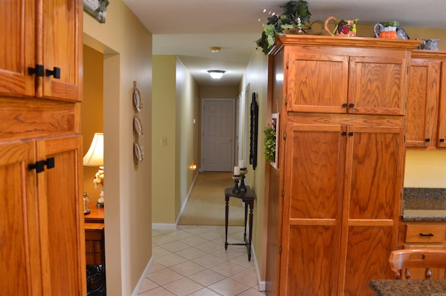 1005 Georgia Ridge Rd, Searcy, AR 72143 - hallway with light tile patterned floors and baseboards