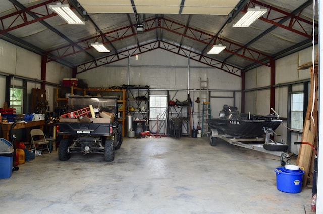 1005 Georgia Ridge Rd, Searcy, AR 72143 - garage featuring metal wall and a workshop area