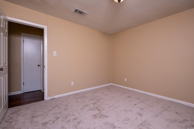 8116 Depriest Rd, Little Rock, AR 72103 - unfurnished room featuring carpet floors, baseboards, and a textured ceiling