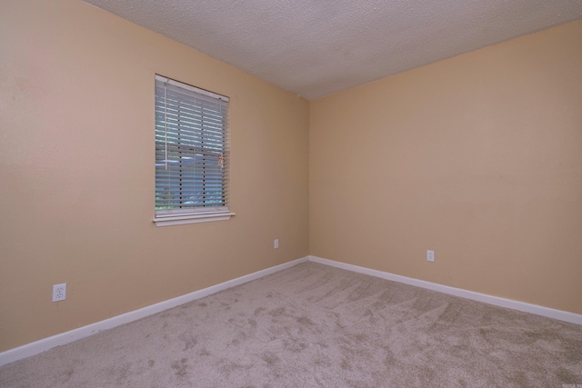 8116 Depriest Rd, Little Rock, AR 72103 - carpeted spare room with baseboards and a textured ceiling