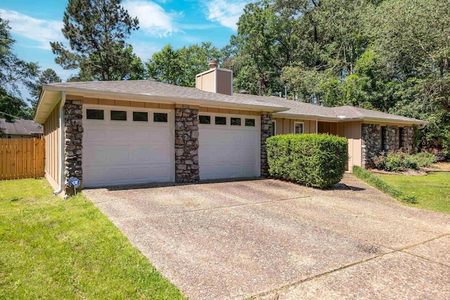 8116 Depriest Rd, Little Rock, AR 72103 - view of front of house with an attached garage, concrete driveway, stone siding, a chimney, and board and batten siding