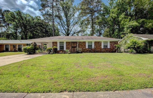 32 Bonnie Park Dr, Pine Bluff, AR 72601 - ranch-style home featuring concrete driveway, a front lawn, an attached carport, and brick siding