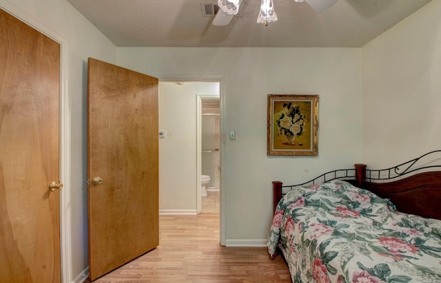 32 Bonnie Park Dr, Pine Bluff, AR 72601 - bedroom with light wood-type flooring, baseboards, and a ceiling fan