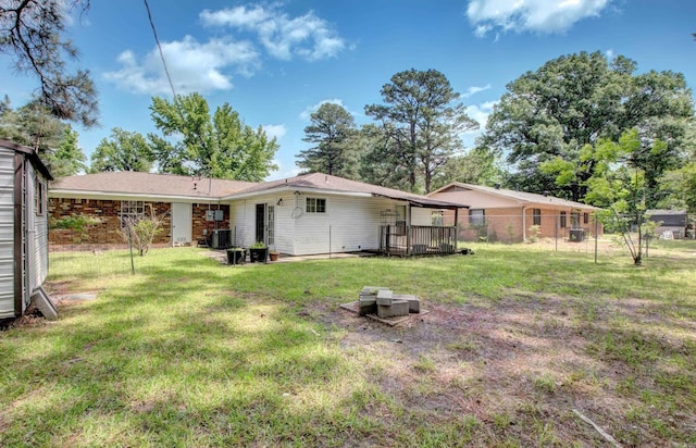 32 Bonnie Park Dr, Pine Bluff, AR 72601 - rear view of property with central AC