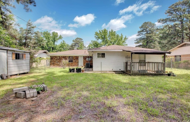 32 Bonnie Park Dr, Pine Bluff, AR 72601 - back of property featuring central AC and a wooden deck