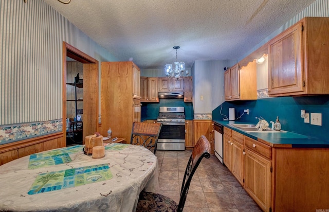 32 Bonnie Park Dr, Pine Bluff, AR 72601 - kitchen featuring stainless steel gas stove, white dishwasher, a chandelier, under cabinet range hood, and a sink