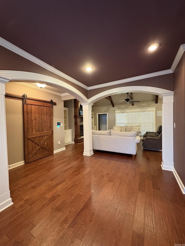 11907 Stonegate, Alexander, AR 72002 - living area featuring ceiling fan, baseboards, dark wood-style flooring, a barn door, and crown molding