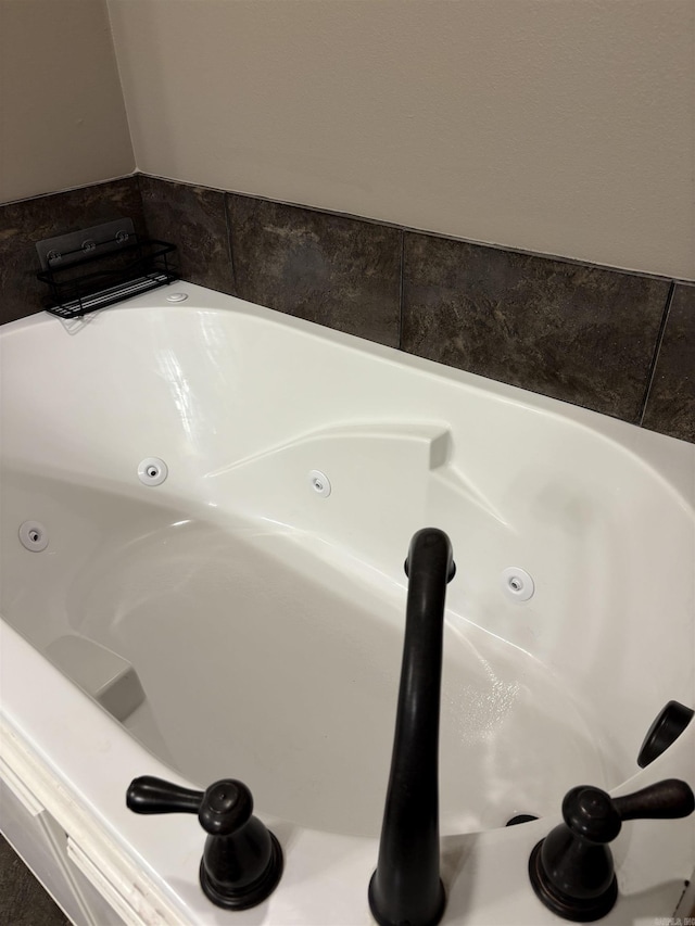 11907 Stonegate, Alexander, AR 72002 - bathroom view of a tub with jets and a sink
