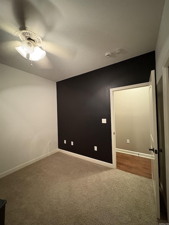 11907 Stonegate, Alexander, AR 72002 - carpeted spare room featuring ceiling fan, baseboards, and a smoke detector