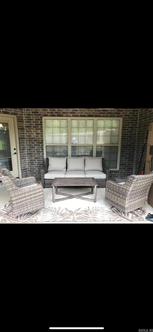 11907 Stonegate, Alexander, AR 72002 - patio at twilight featuring an outdoor hangout area