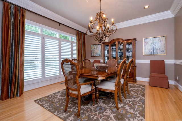 18 Chenal Cir, Little Rock, AR 72223 - dining area with a chandelier, light wood-style floors, baseboards, ornamental molding, and recessed lighting