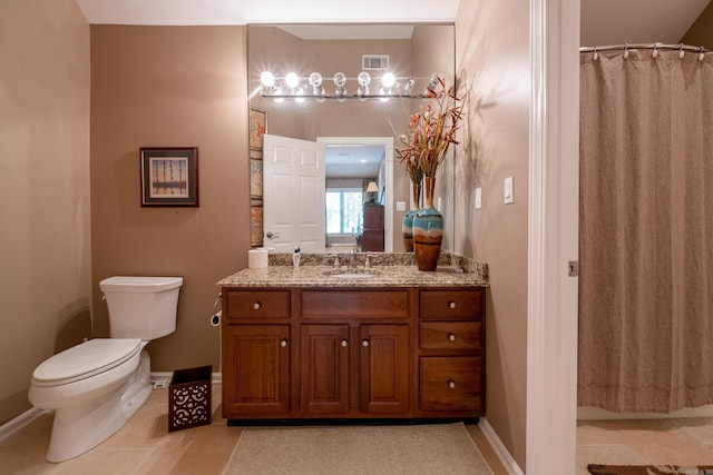 18 Chenal Cir, Little Rock, AR 72223 - full bathroom featuring vanity, toilet, baseboards, and tile patterned flooring