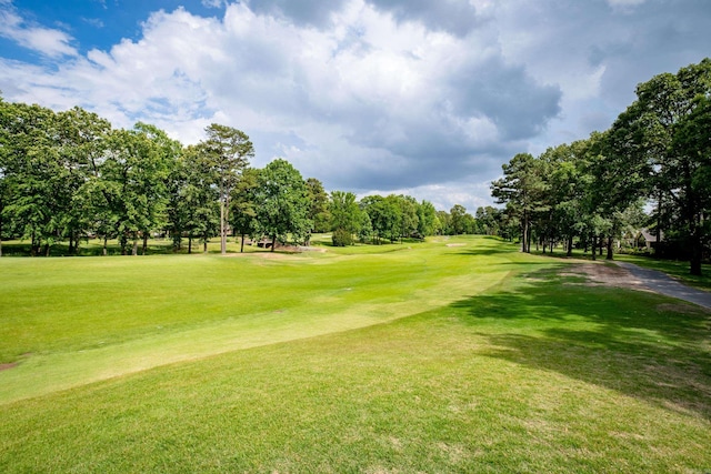 18 Chenal Cir, Little Rock, AR 72223 - surrounding community featuring view of wooded area, a lawn, and view of golf course