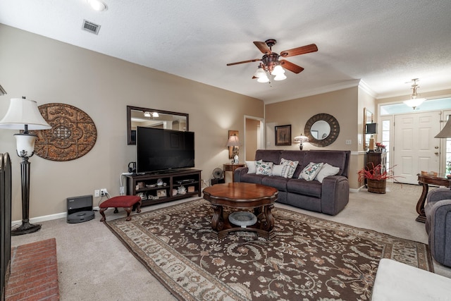15 Edgewood Dr, Arkadelphia, AR 71923 - living area featuring carpet, a ceiling fan, baseboards, a textured ceiling, and crown molding