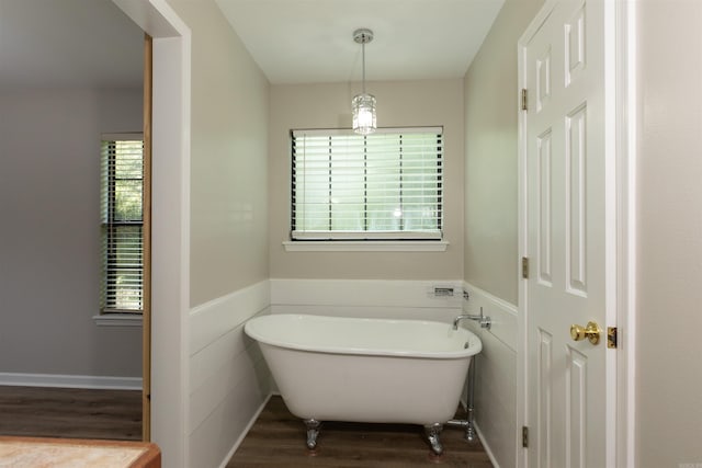 1309 Frontier, White Hall, AR 71602 - full bath featuring wood finished floors and a freestanding bath