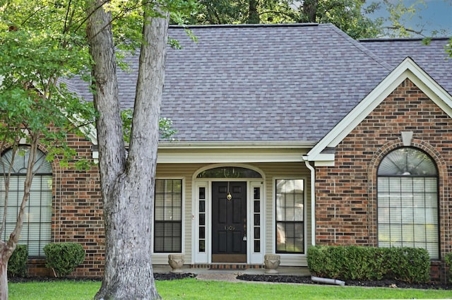 1309 Frontier, White Hall, AR 71602 - view of front of house with roof with shingles and brick siding