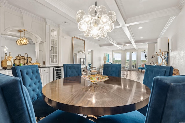 130 Grand Isle Dr Unit 1D, Hot Springs, AR 71913 - dining space featuring a chandelier, coffered ceiling, beamed ceiling, ornamental molding, and beverage cooler