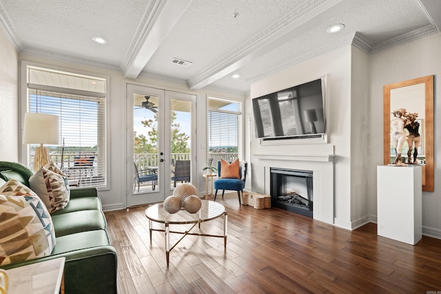 130 Grand Isle Dr Unit 1D, Hot Springs, AR 71913 - living area with a textured ceiling, crown molding, french doors, wood finished floors, and a large fireplace
