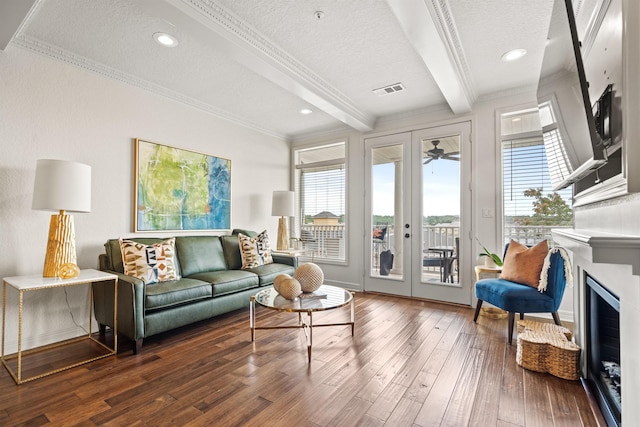 130 Grand Isle Dr Unit 1D, Hot Springs, AR 71913 - living room featuring french doors, beamed ceiling, crown molding, a textured ceiling, and wood finished floors