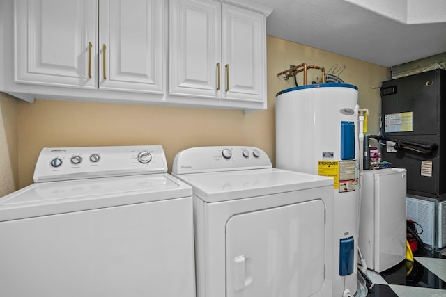 130 Grand Isle Dr Unit 1D, Hot Springs, AR 71913 - washroom with separate washer and dryer, electric water heater, and cabinet space