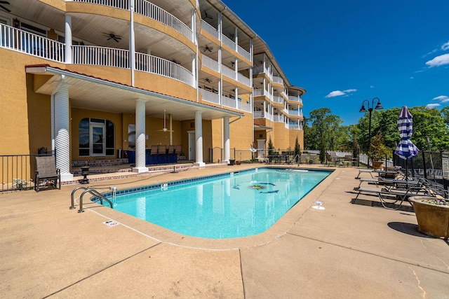 130 Grand Isle Dr Unit 1D, Hot Springs, AR 71913 - community pool featuring ceiling fan and a patio