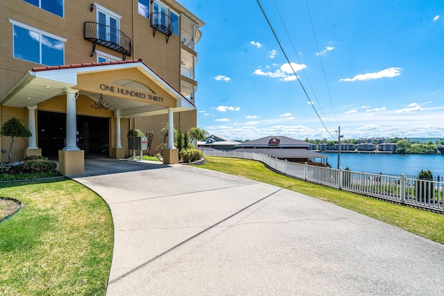 130 Grand Isle Dr Unit 1D, Hot Springs, AR 71913 - view of concrete driveway with a water view