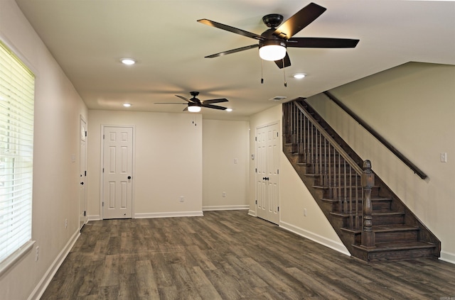 904 W Holland, White Hall, AR 71602 - unfurnished living room featuring a ceiling fan, dark wood finished floors, recessed lighting, stairs, and baseboards
