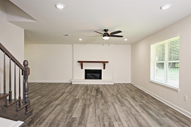 904 W Holland, White Hall, AR 71602 - unfurnished living room featuring ceiling fan, dark wood-type flooring, recessed lighting, stairs, and baseboards