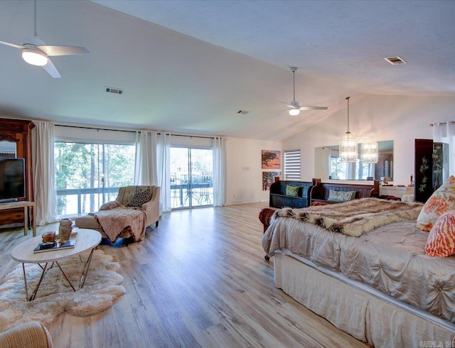 366-370 Restful Ridge Rd, Hot Springs, AR 71913 - bedroom featuring access to outside, lofted ceiling, light wood-style floors, and a chandelier