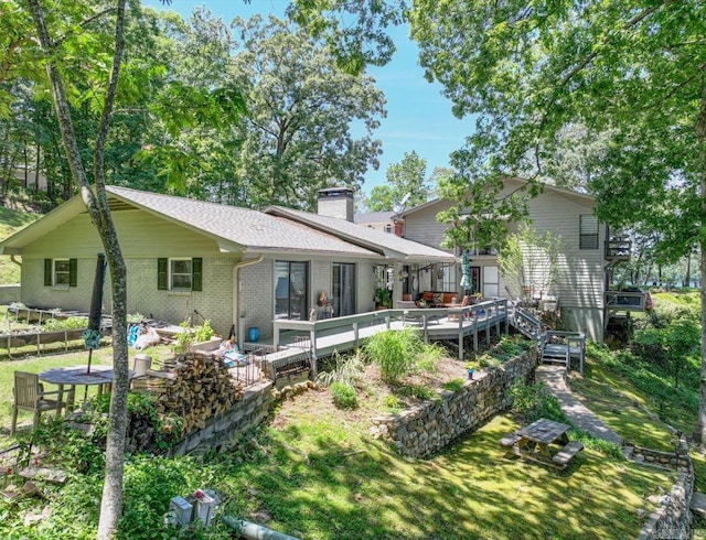 366-370 Restful Ridge Rd, Hot Springs, AR 71913 - rear view of house with a wooden deck, a chimney, and brick siding