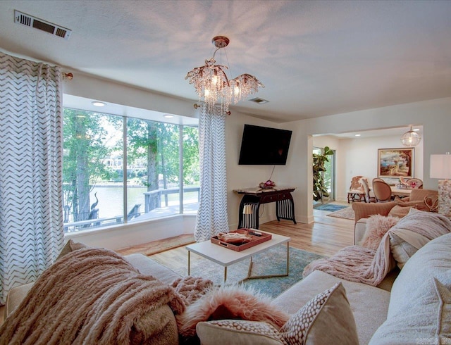 366-370 Restful Ridge Rd, Hot Springs, AR 71913 - living area with a chandelier and wood finished floors