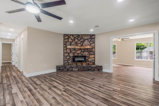 1907 Creekwood Dr, Conway, AR 72032 - unfurnished living room with a ceiling fan, wood finished floors, baseboards, and recessed lighting