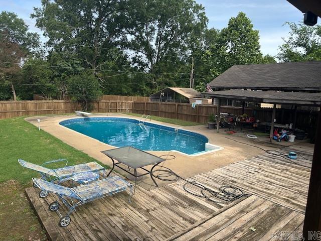 1 Rogers Dr, Morrilton, AR 72110 - view of swimming pool featuring a patio area and a diving board