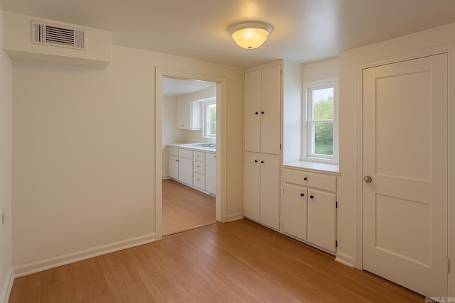 1617 Maple St, North Little Rock, AR 72114 - interior space featuring light wood-style flooring and baseboards