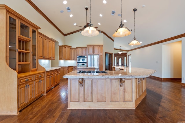 261 Peninsula Dr, Hot Springs, AR 71901 - kitchen featuring appliances with stainless steel finishes, a spacious island, high vaulted ceiling, brown cabinetry, and dark wood-type flooring