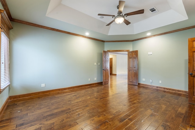 261 Peninsula Dr, Hot Springs, AR 71901 - unfurnished room featuring a tray ceiling, a ceiling fan, dark wood-style flooring, crown molding, and healthy amount of natural light