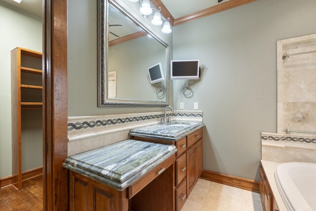 261 Peninsula Dr, Hot Springs, AR 71901 - full bathroom featuring ornamental molding, a bathtub, vanity, and baseboards