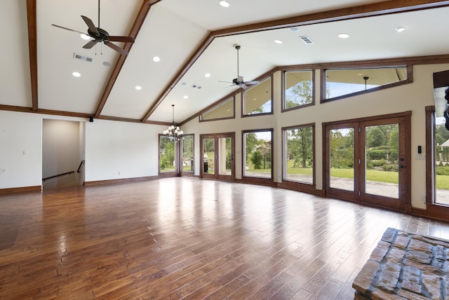 261 Peninsula Dr, Hot Springs, AR 71901 - unfurnished living room featuring a ceiling fan, a chandelier, high vaulted ceiling, wood finished floors, and baseboards