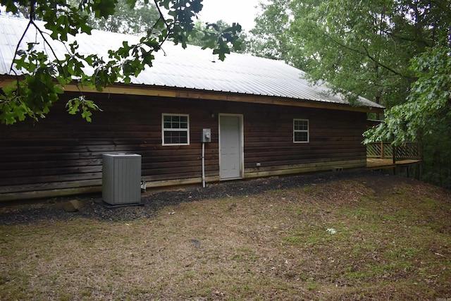 10355 Rodeo Rd, Belleville, AR 72824 - back of house featuring central AC, a wooden deck, and metal roof