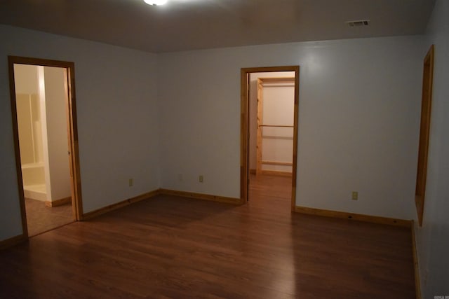 10355 Rodeo Rd, Belleville, AR 72824 - empty room featuring wood finished floors and baseboards