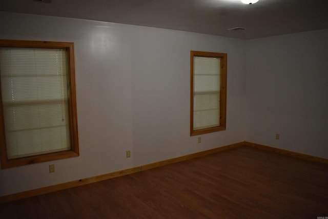 10355 Rodeo Rd, Belleville, AR 72824 - empty room with wood finished floors and baseboards