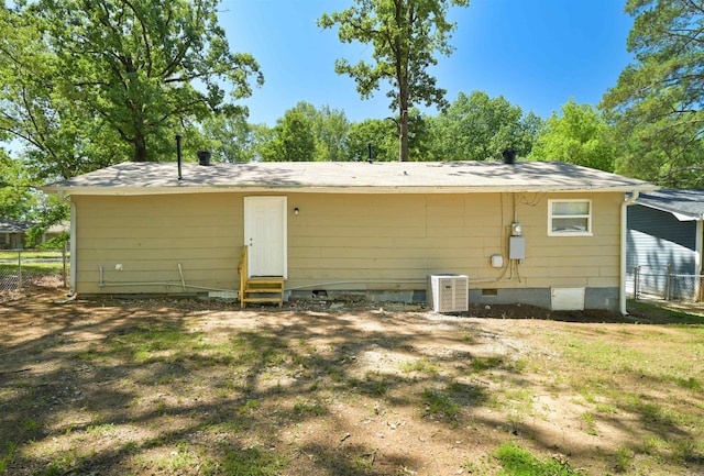 7710 Bradley Dr, Little Rock, AR 72209 - rear view of house featuring entry steps, crawl space, and central air condition unit