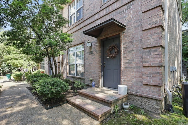 7106 Ohio St Unit 6, Little Rock, AR 72207 - property entrance featuring brick siding