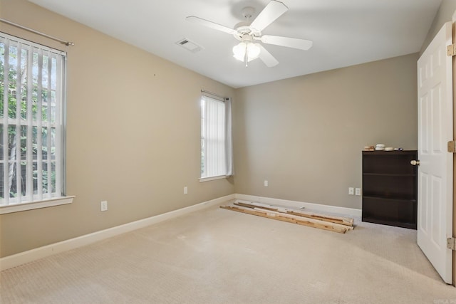 7106 Ohio St Unit 6, Little Rock, AR 72207 - unfurnished bedroom featuring carpet flooring, baseboards, and a ceiling fan