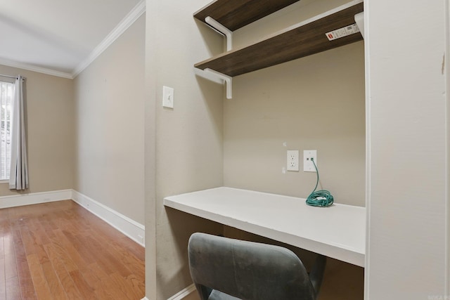 7106 Ohio St Unit 6, Little Rock, AR 72207 - office featuring crown molding, wood finished floors, and baseboards